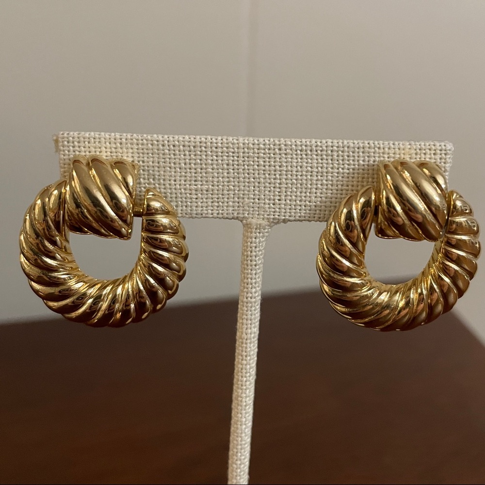 Gold tone door knocker style earrings.Vintage. Designer Inspired.